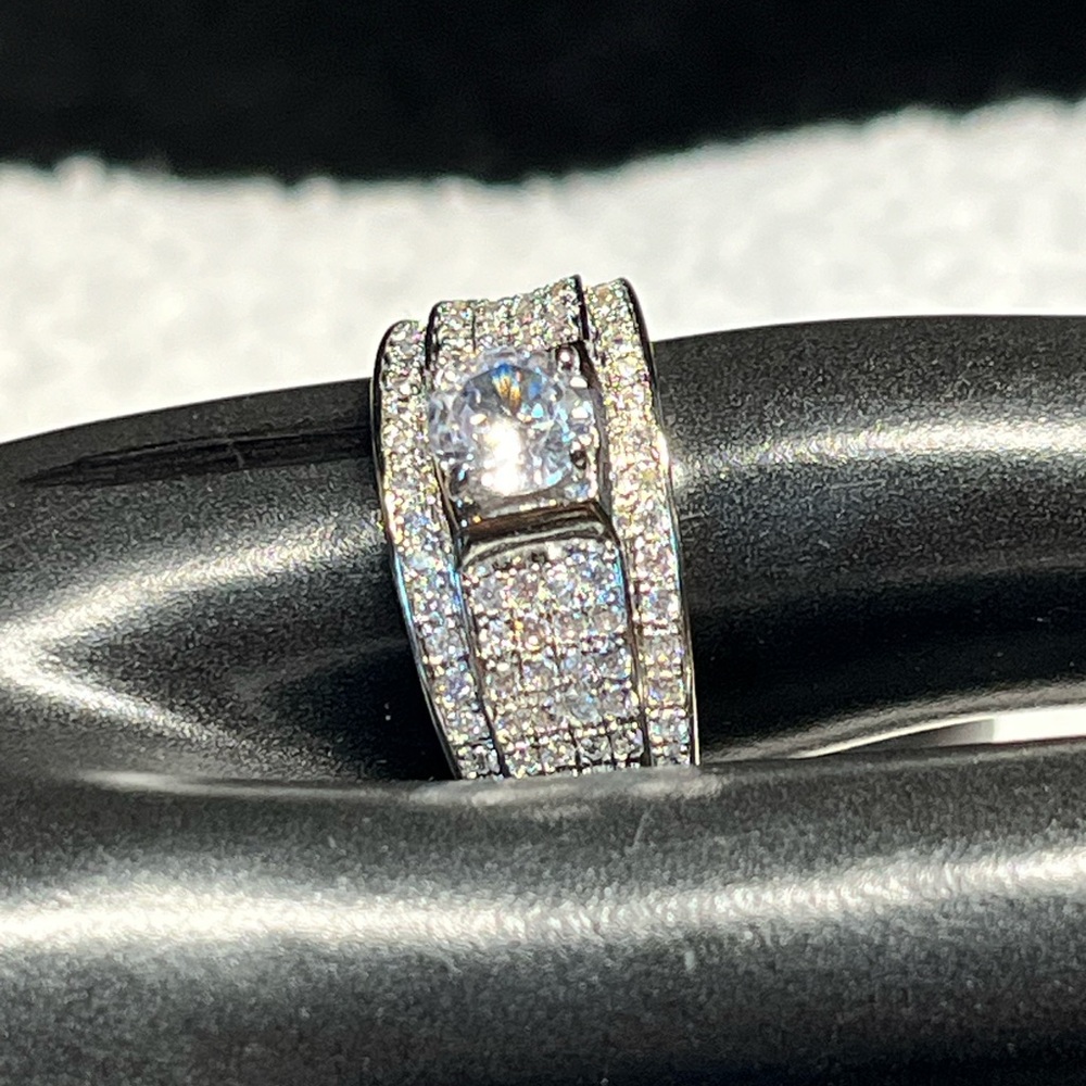 Unisex ring wide band with large centre stone and Diamond like side stones